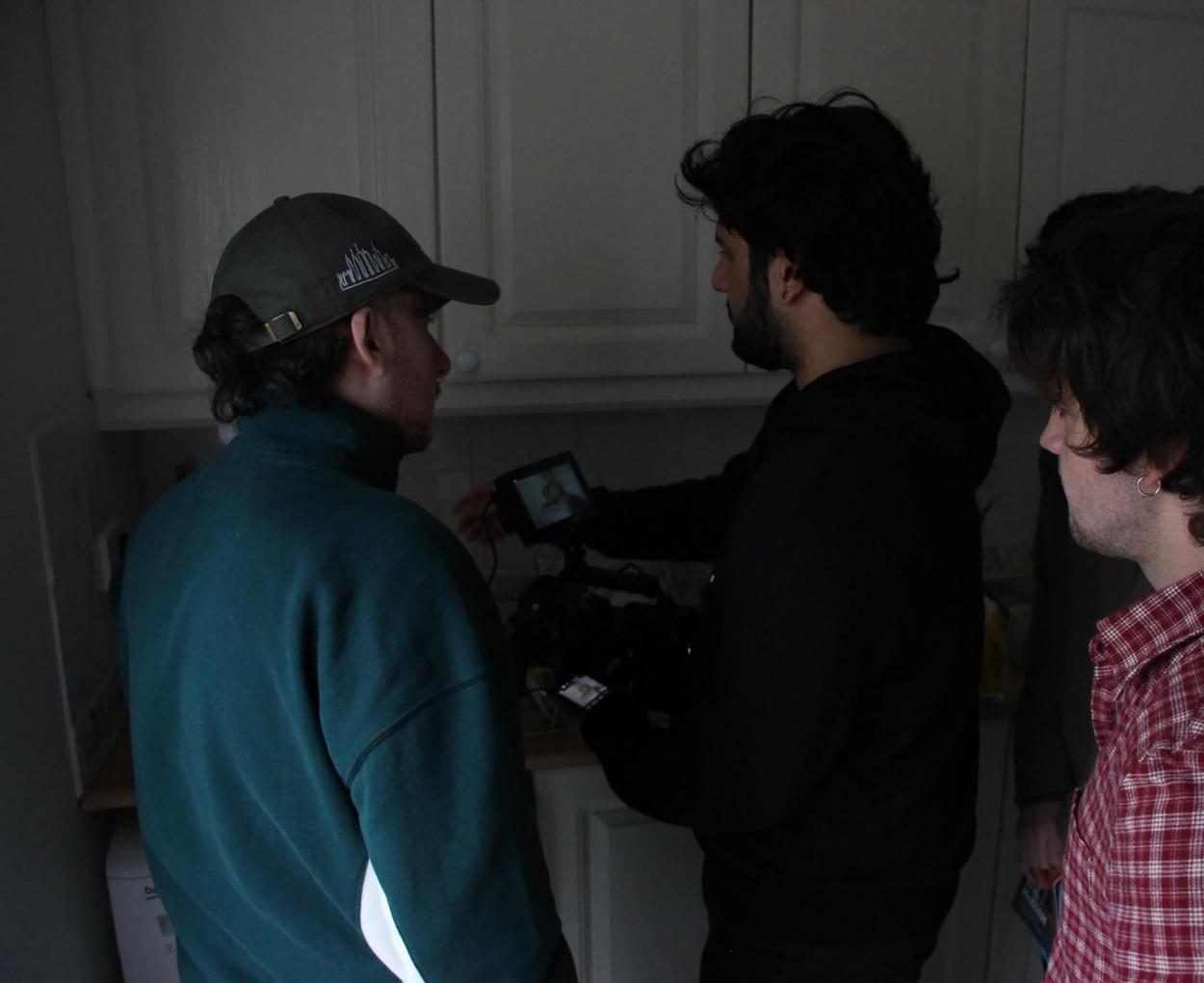 a group of people standing in a room