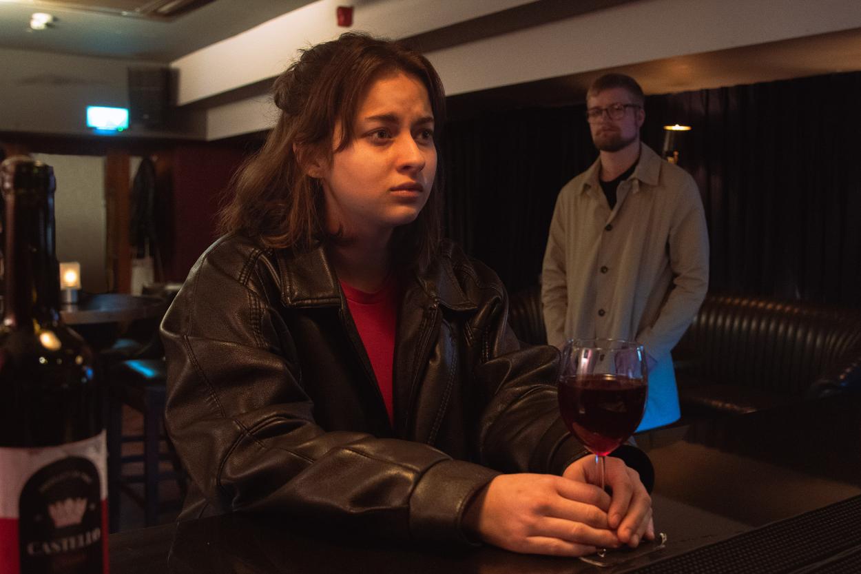 Saoirse (Bruna Zavarello) and Brendan (Joshua Fromholz) meeting at the bar in “Only Way Out Is Through” (“Gentle Threats” chapter 2). 