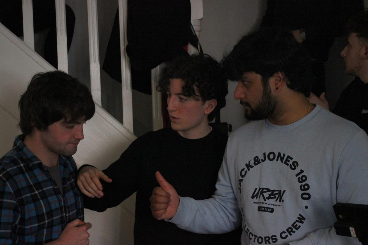 a group of people standing in a room