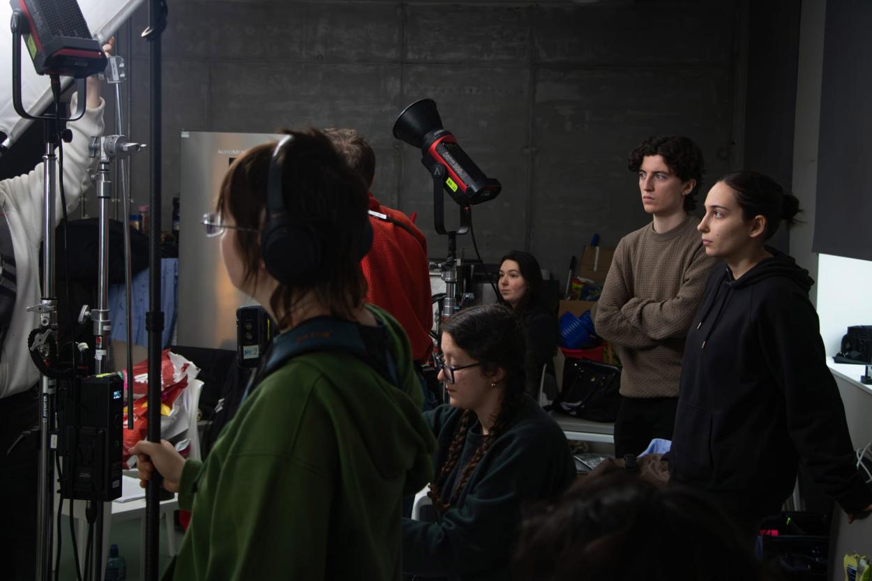 a group of people standing in a room
