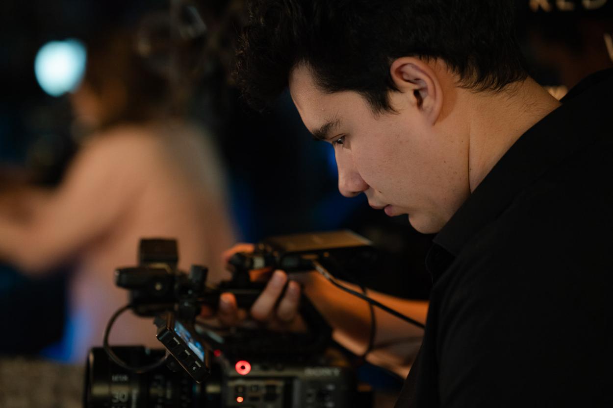 Ivan Chavira (DoP / co-director) setting up a camera on the set of Only Way Out is Through (Gentle Threats, Chapter 2)