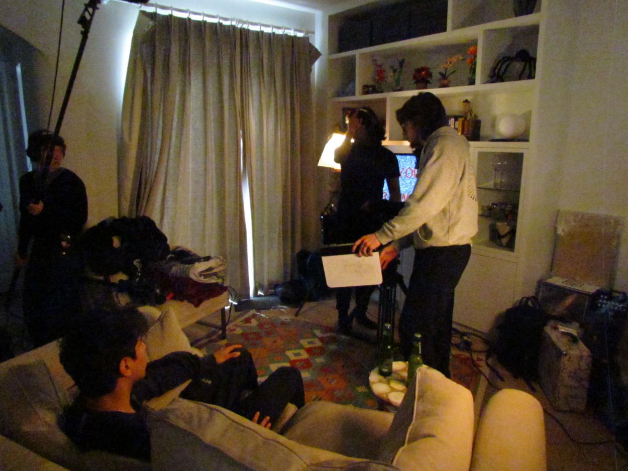 a group of people sitting around a living room