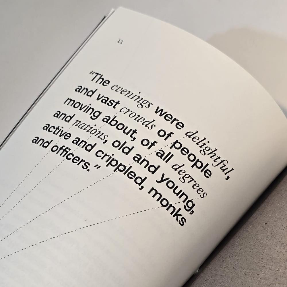 Close-up page from "Fragments: Lisbon, 1755", featuring a quote in black serif and sans-serif typography with dashed lines radiating towards a seismic epicentre
