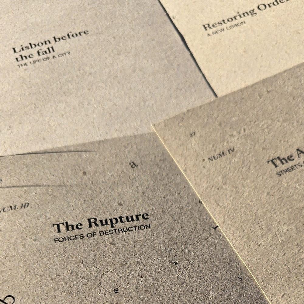 Close-up of four coloured biodegradable vegan paper dividers marking the sections of the book "Fragments: Lisbon, 1755"