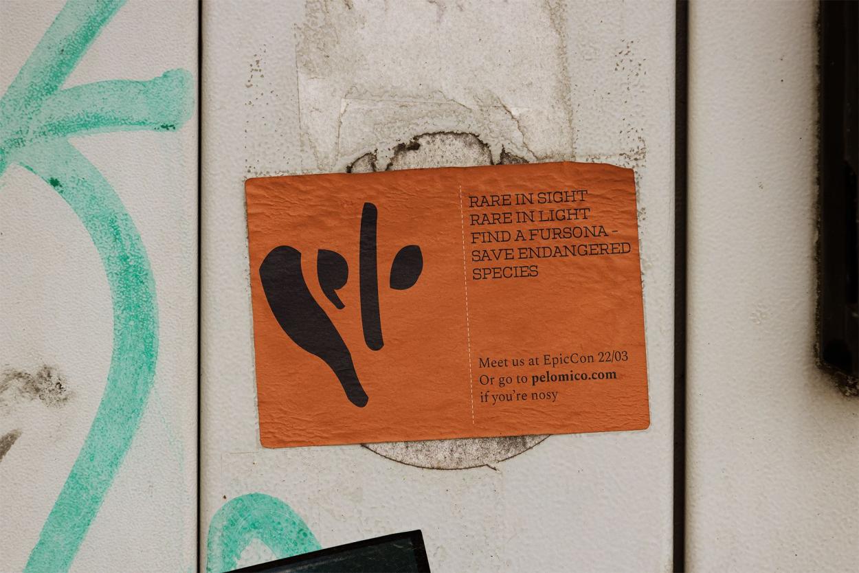 outdoor sticker ad on a wall promoting Pelomico