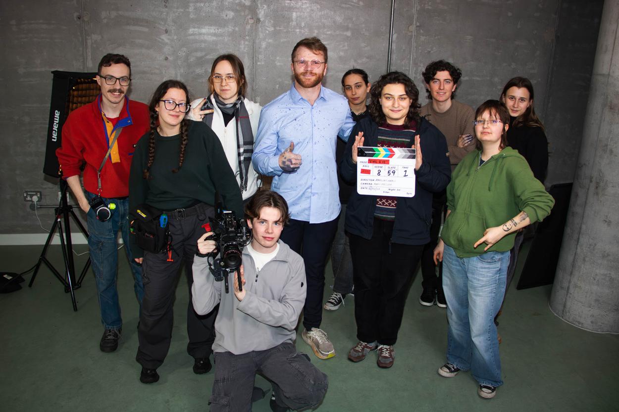 a group of people posing for a photo