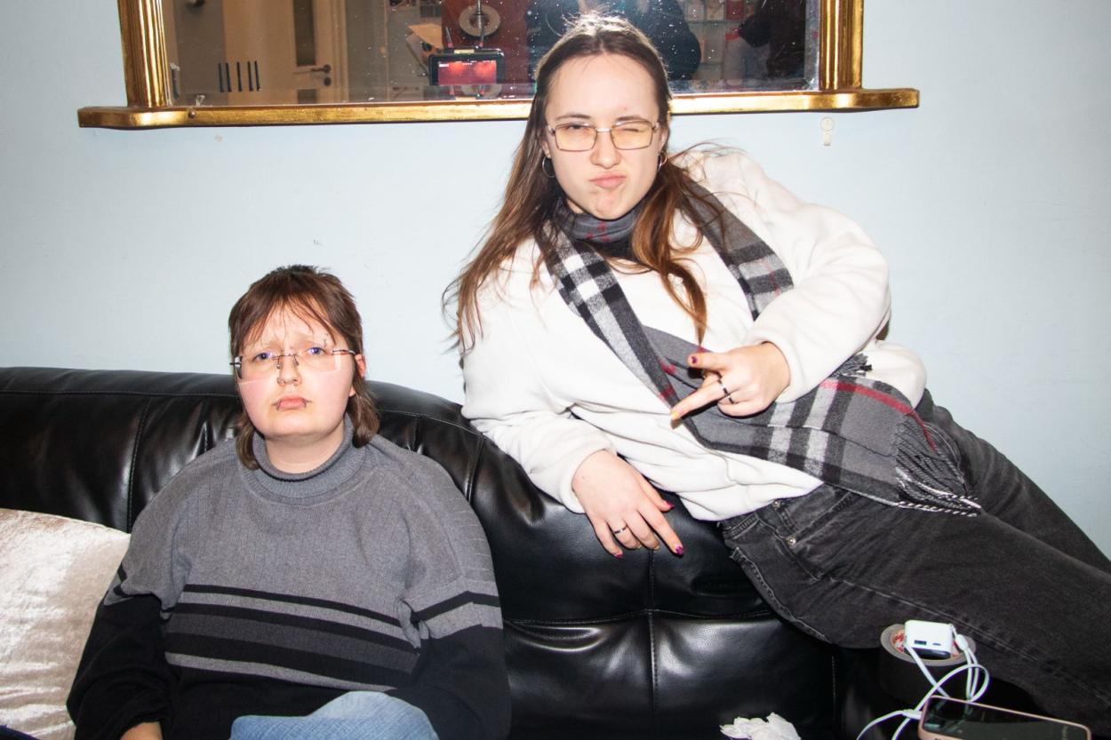 a man and a woman sitting on a couch