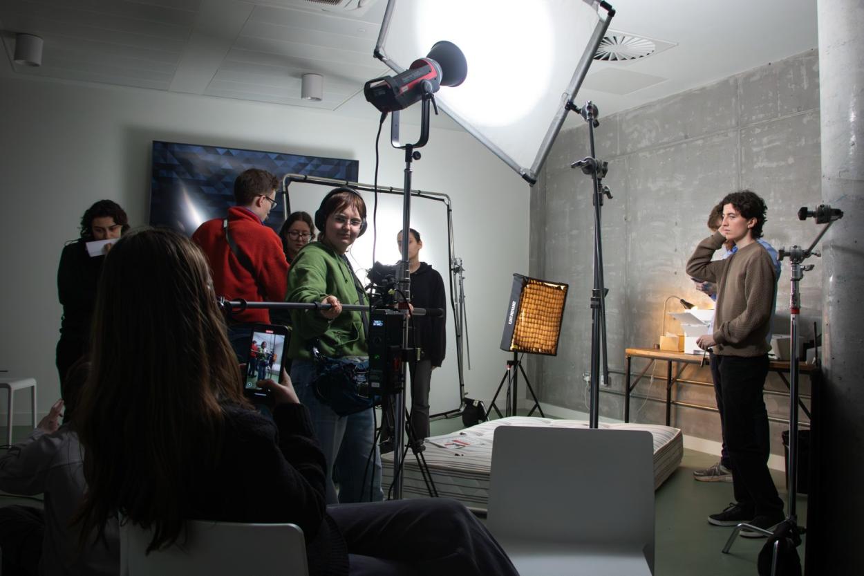 a group of people standing in a room