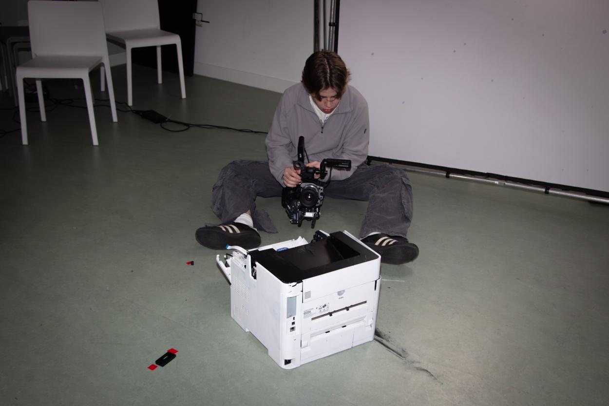 Man operating camera equipment 