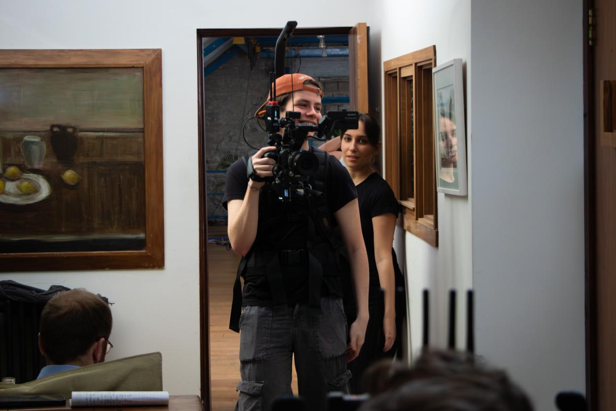 Man operating camera equipment 