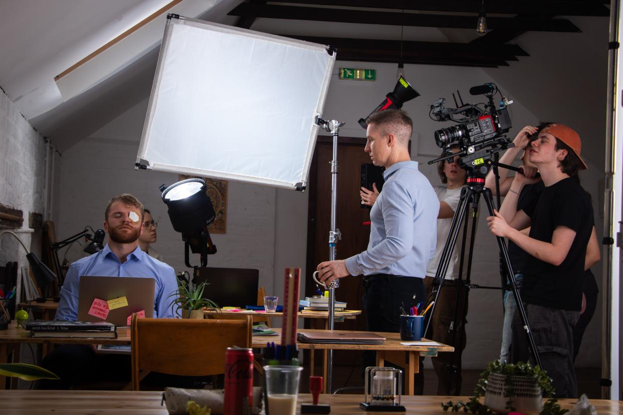 Man operating camera equipment 