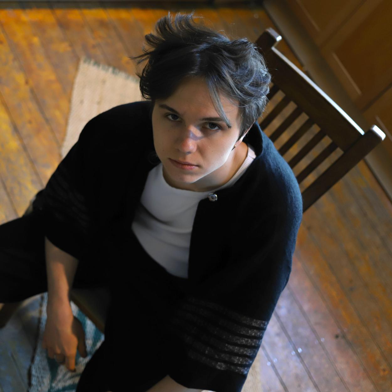 a woman looking at the camera