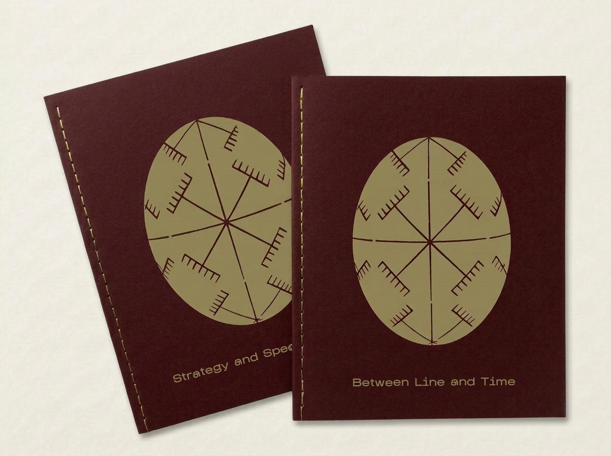 Two burgundy-colored book covers with featuring a circular geometric pysanka (Ukrainian Easter egg) design with radiating lines and decorative patterns. The left cover reads "Strategy and Spec" and the right reads "Between Line and Time," both with saddle-stitch binding visible.