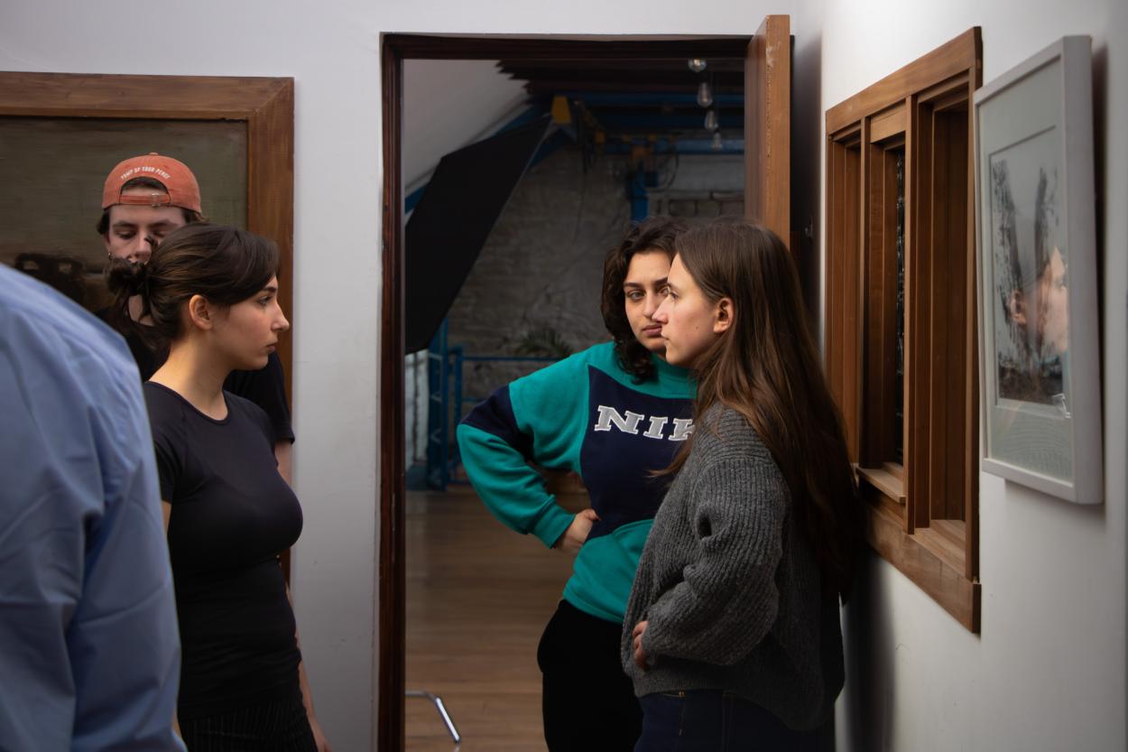a group of people standing in a room