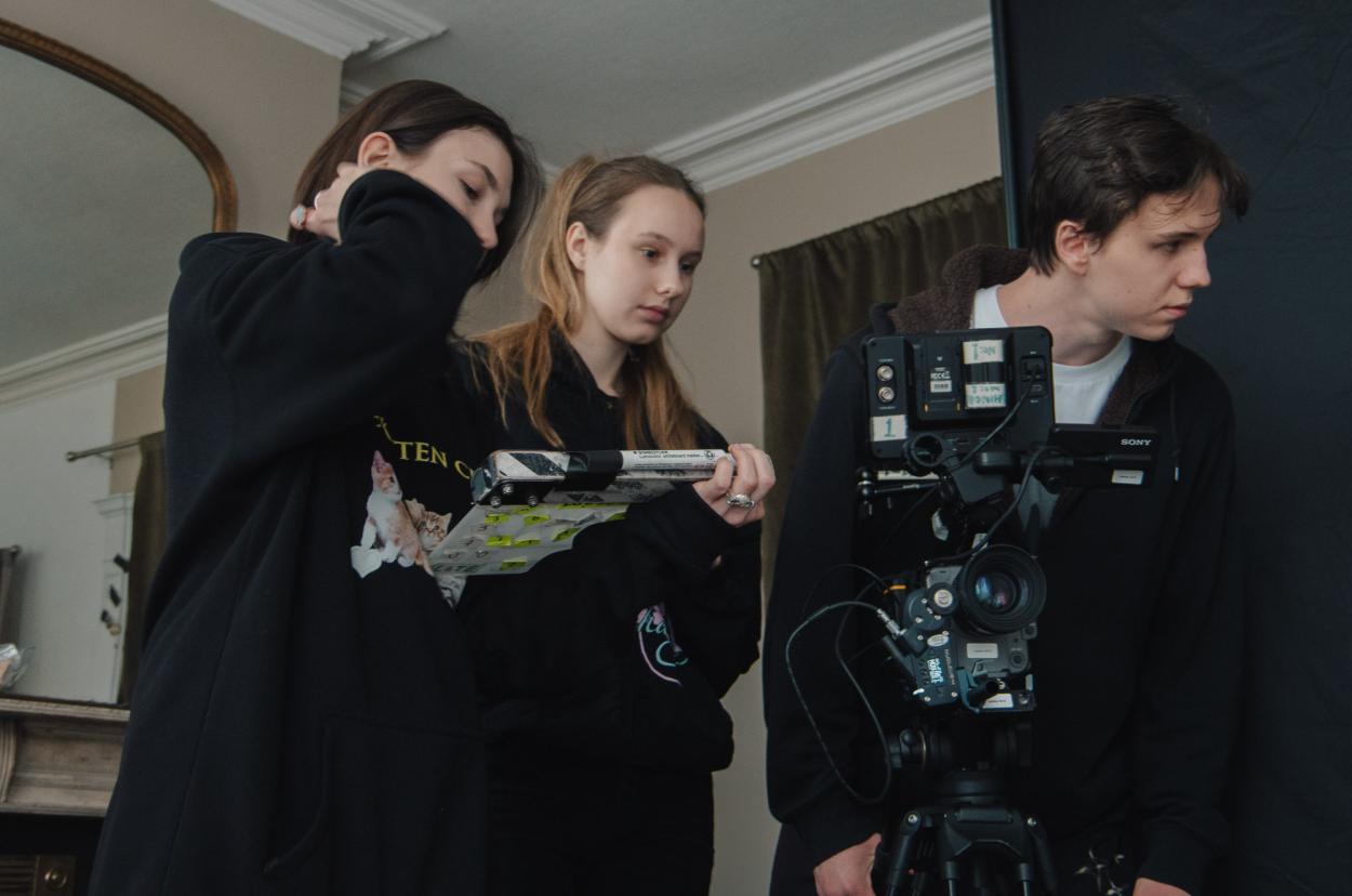 a group of people standing in a room