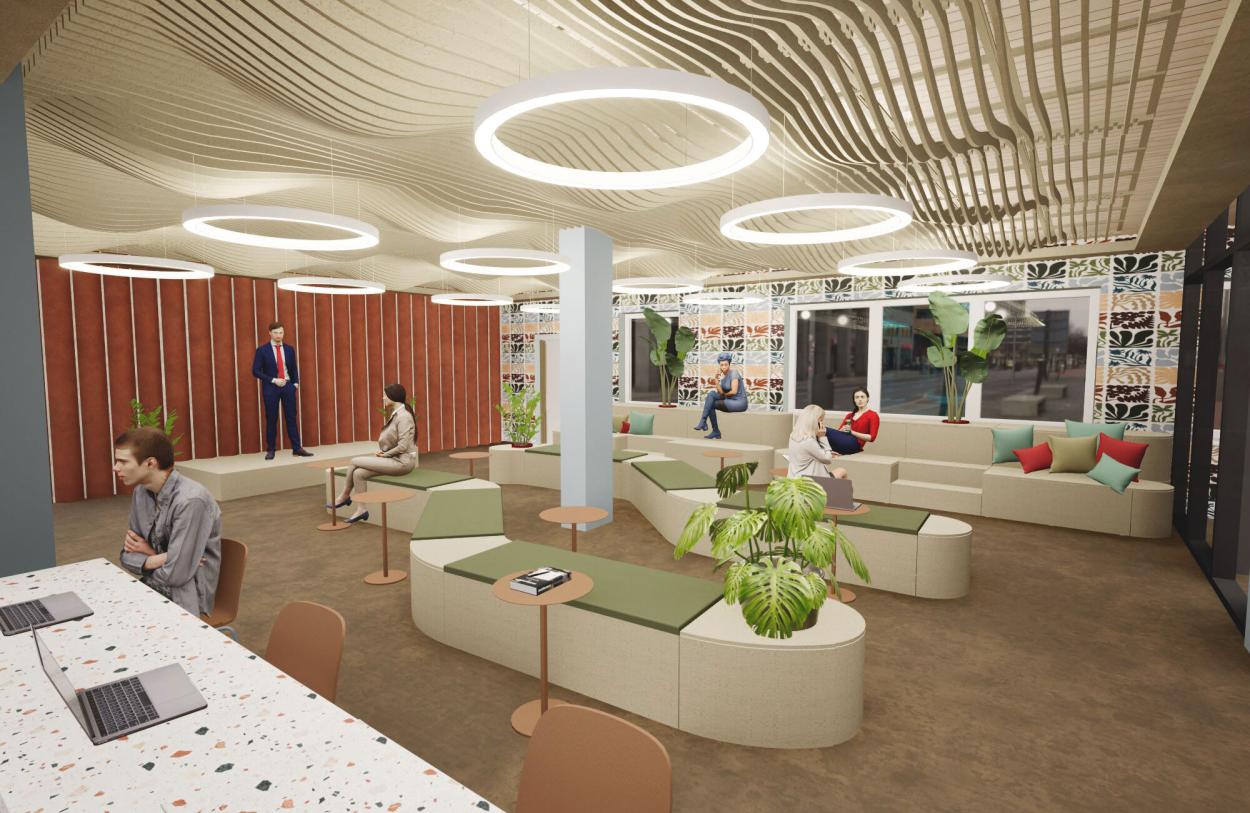 Image show the ground floor community area and hot desks.