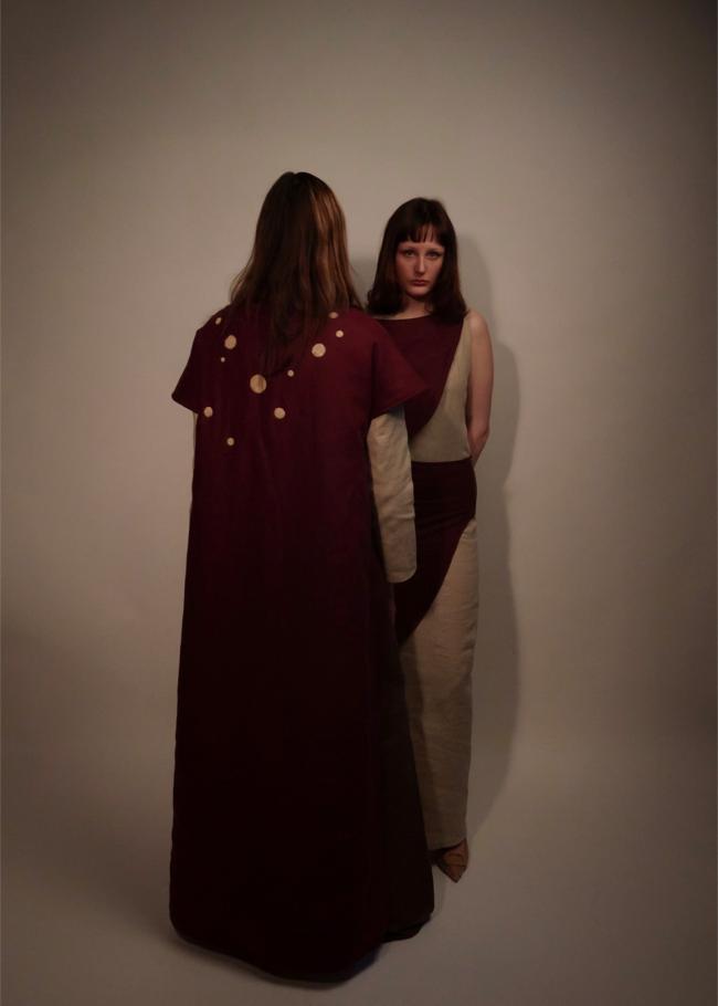 Two models, one facing the camera and one facing away