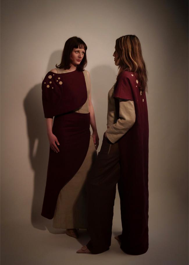 Two models facing each other