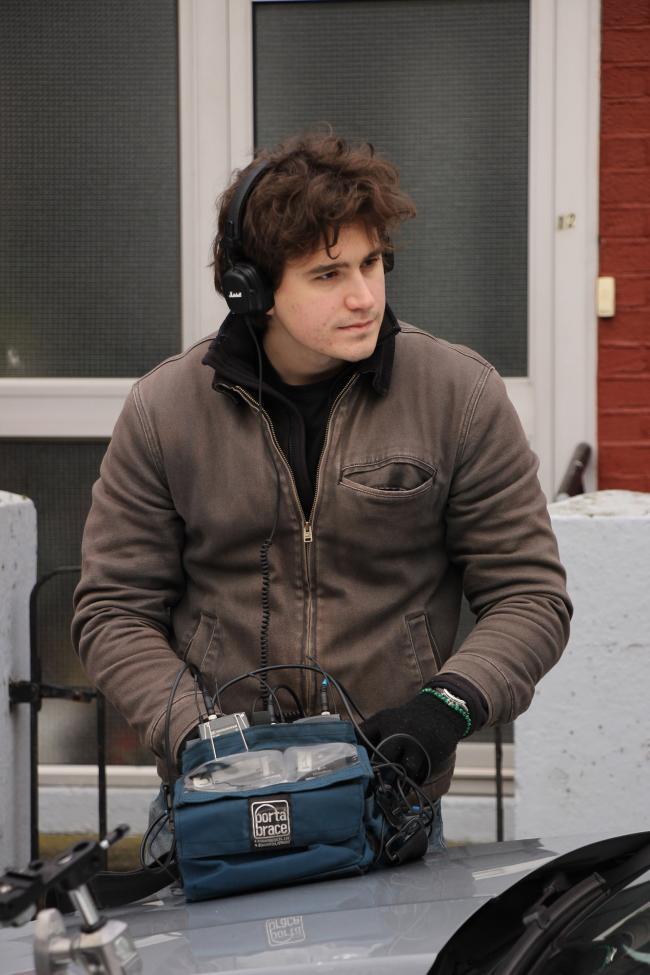 a person holding a bag of luggage