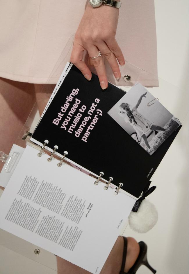 Editorial spread combining bold typography and imagery insert