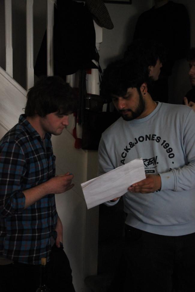 a group of people standing in a room