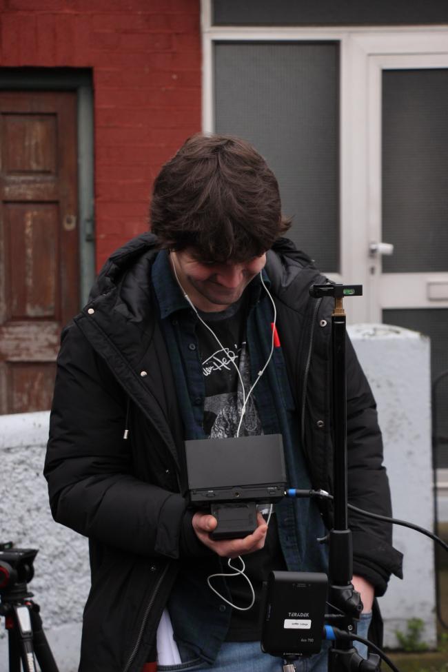 a person holding a camera