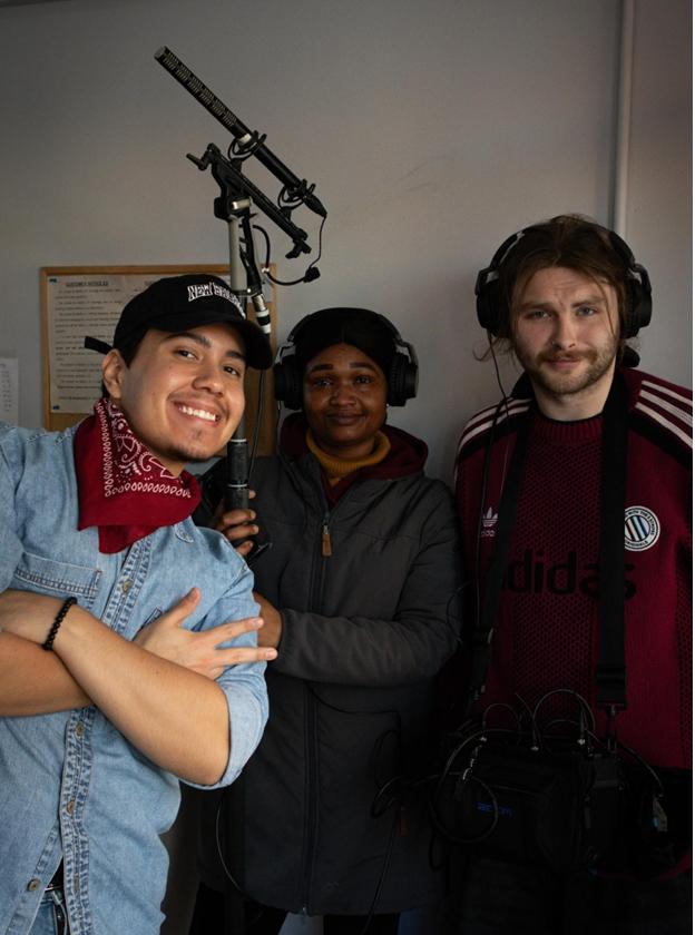 a group of people posing for the camera