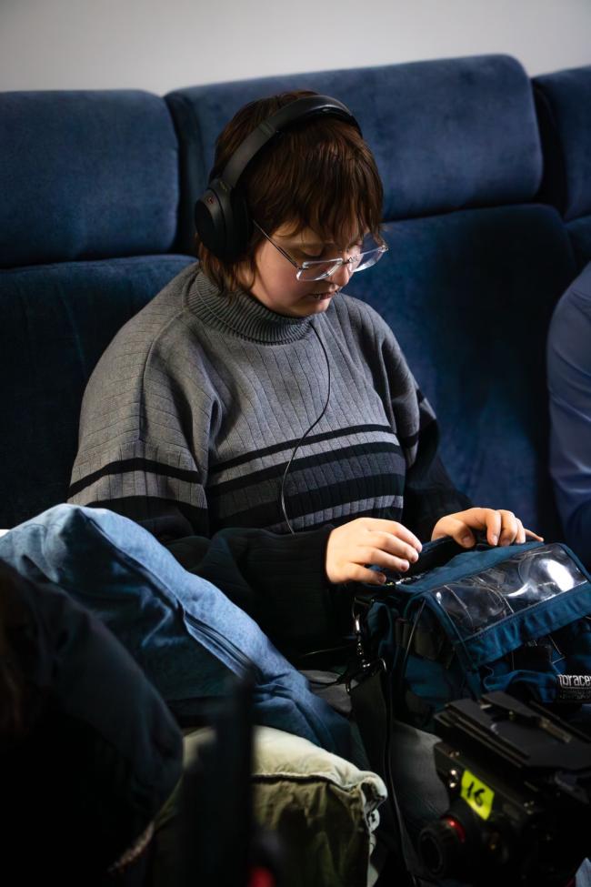 a person sitting on a couch
