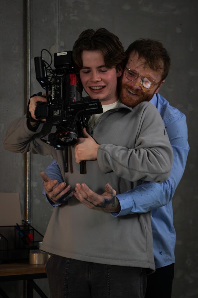 Man operating camera equipment 