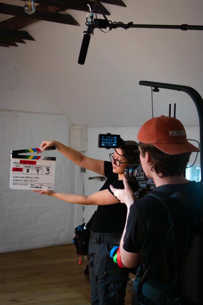Man operating camera equipment 