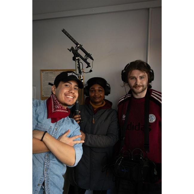 a group of people posing for the camera