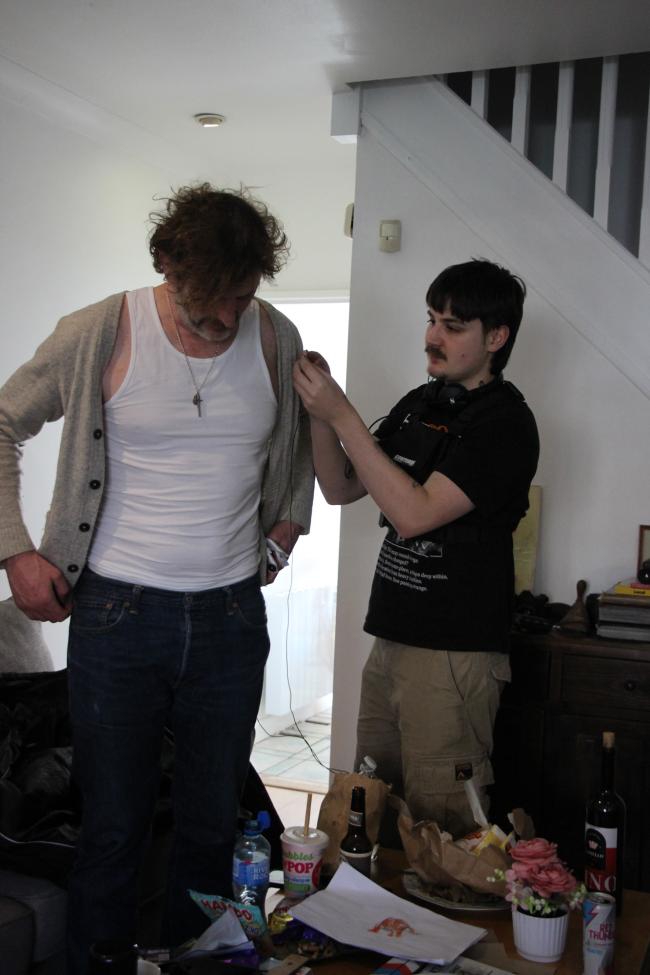 a man and a woman standing in a room