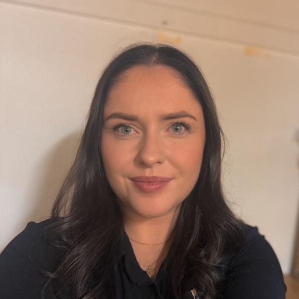 a woman smiling for the camera