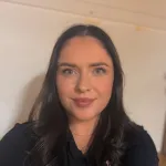 a woman smiling for the camera