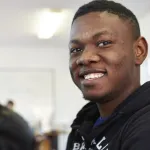 a man smiling for the camera