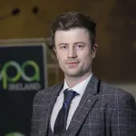 a man wearing a suit and tie