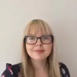 a person smiling for the camera