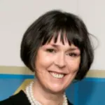 a woman smiling for the camera