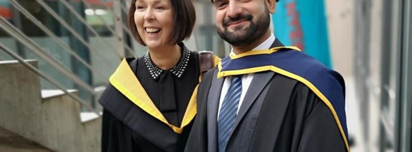 Accountancy lecturer Paula Byrne with a graduating student