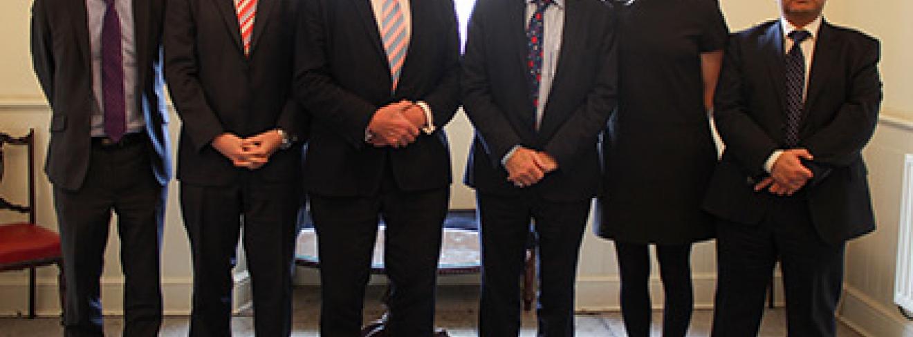 Minister Halligan with Diarmuid Hegarty and Heads of Business, Computing and Graduate Business