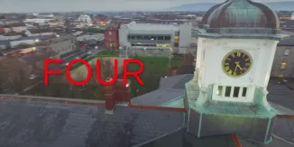 a clock on the side of a building