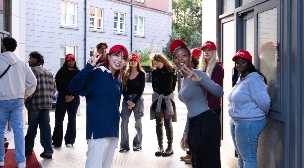 Griffith College students waving at the camera