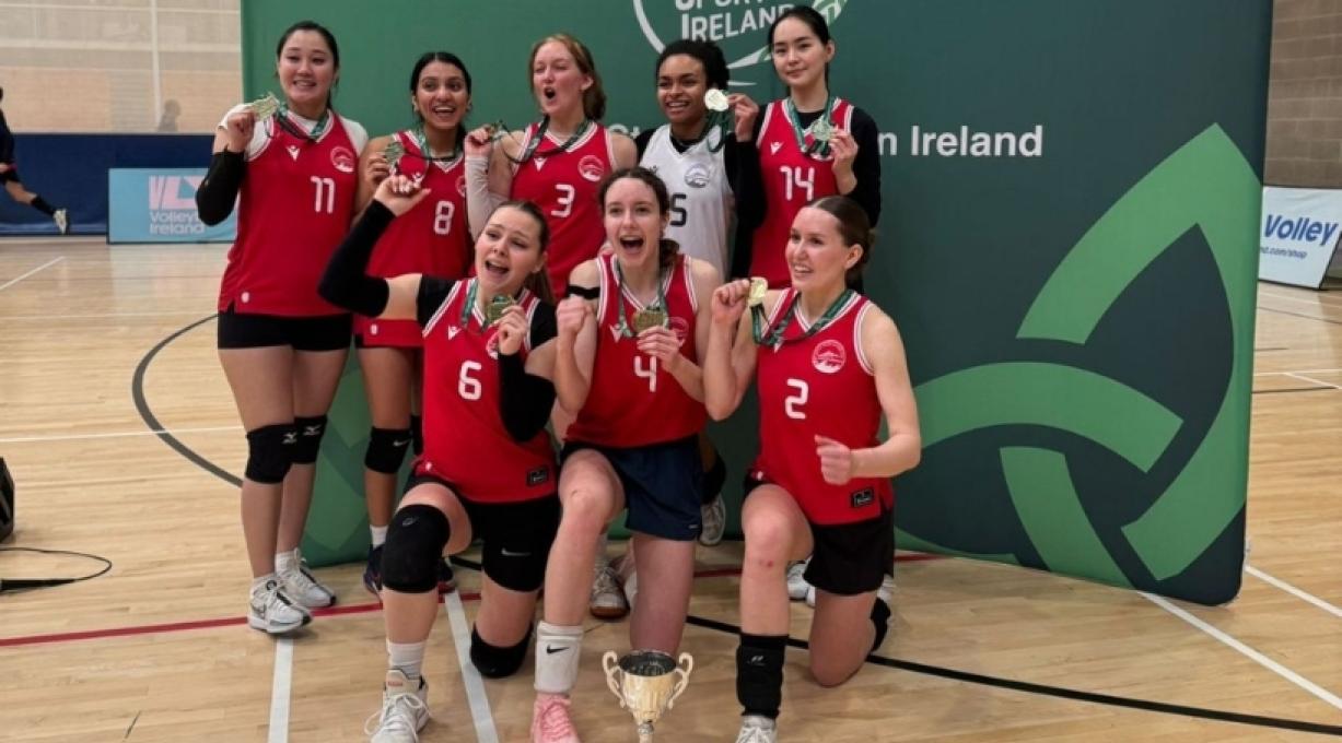 a group of people posing for the camera